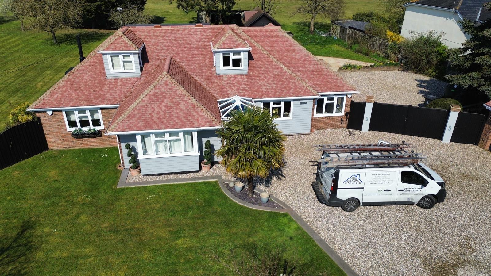 Bird view of a house after roof cleaning in Essex