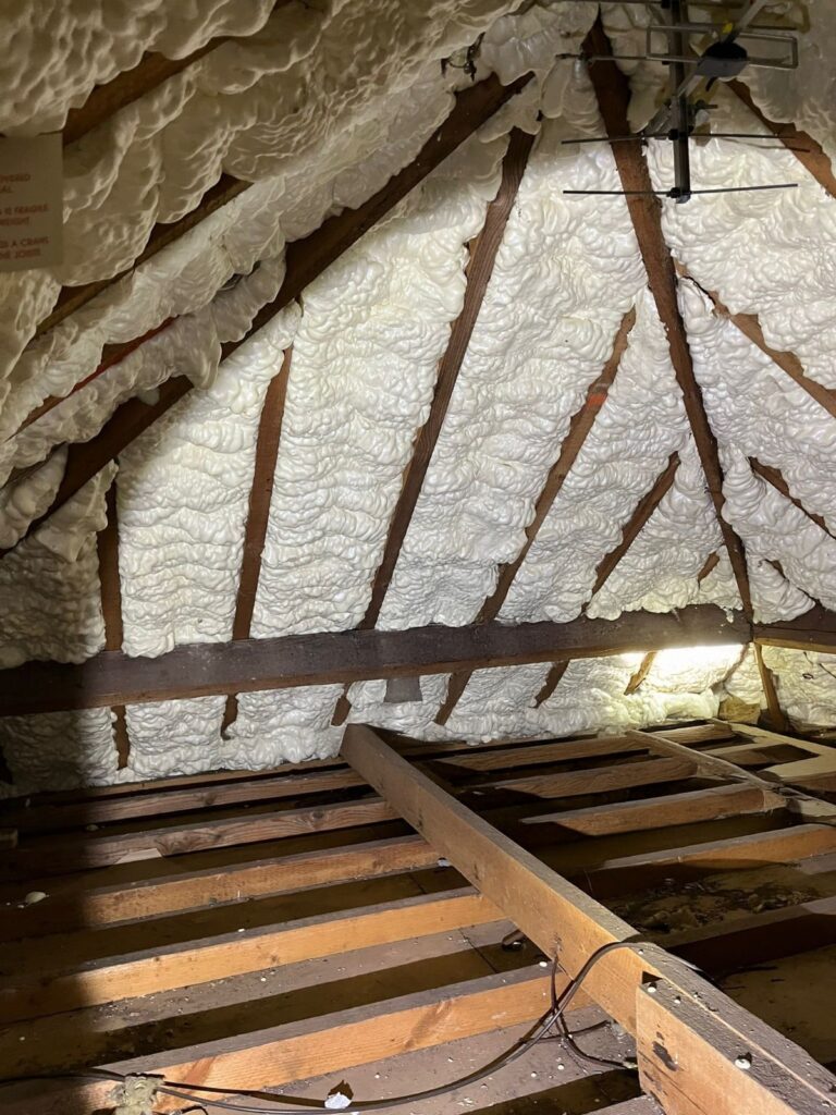 Spray foam insulation removal for preventing roof damage