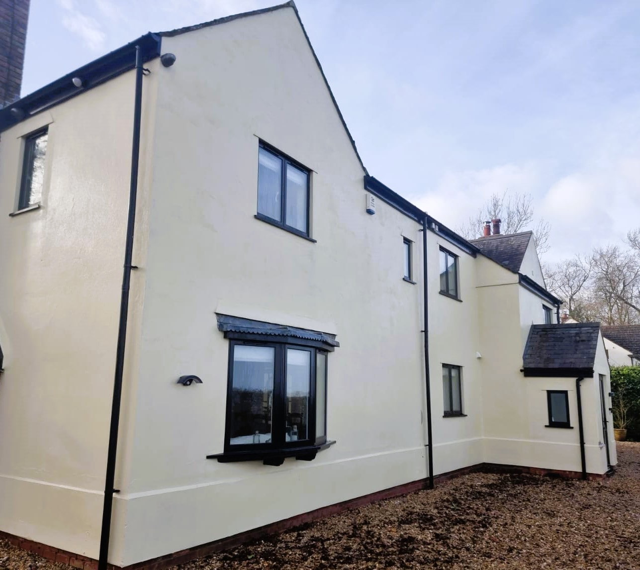 Professional exterior cleaning services improving the appearance of a residential property