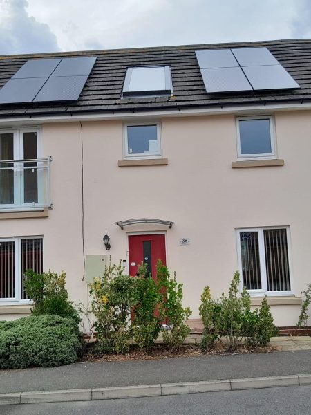 Modern home exterior finished with ProPERLA wall colours including Warm White, Magnolia, Smokey White, and Heritage White.