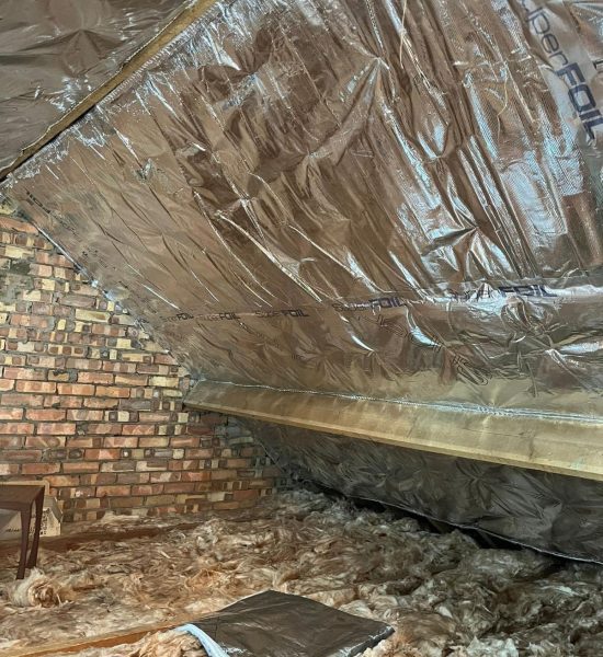 Inetrior shot of loft showing Superfoil Loft Insulation installed by Universal Eco Homes loft insulation installers