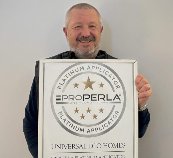 Chris from wall and roof cleaning company Universal Eco Homes holding Properla approved certificate